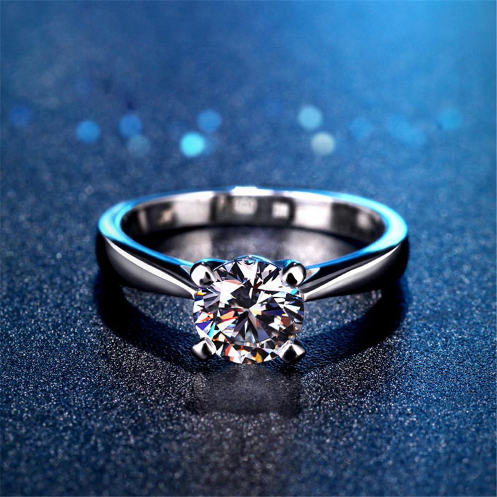 Classic Round Stone Four Prong Sterling Silver Ring