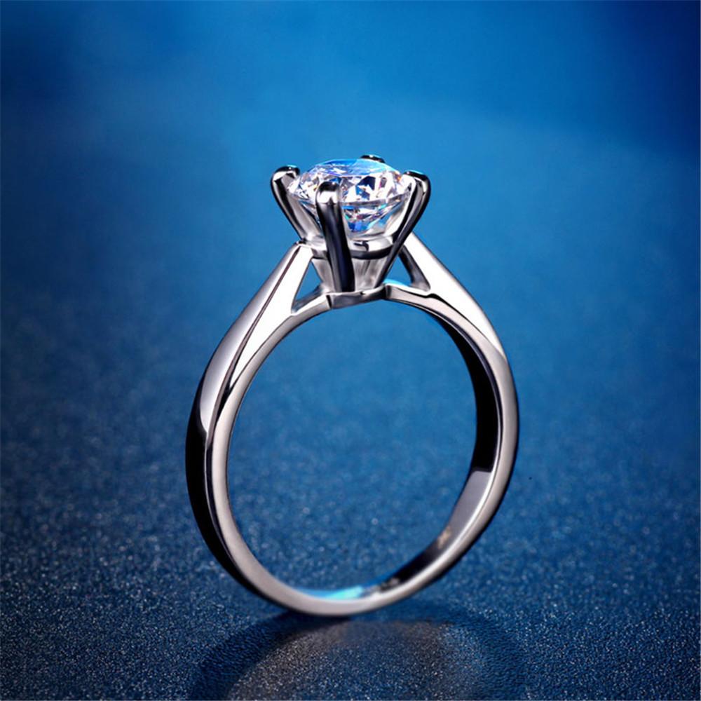 Classic Round Stone Four Prong Sterling Silver Ring