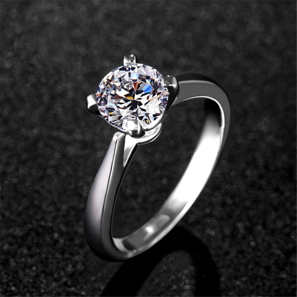 Classic Round Stone Four Prong Sterling Silver Ring